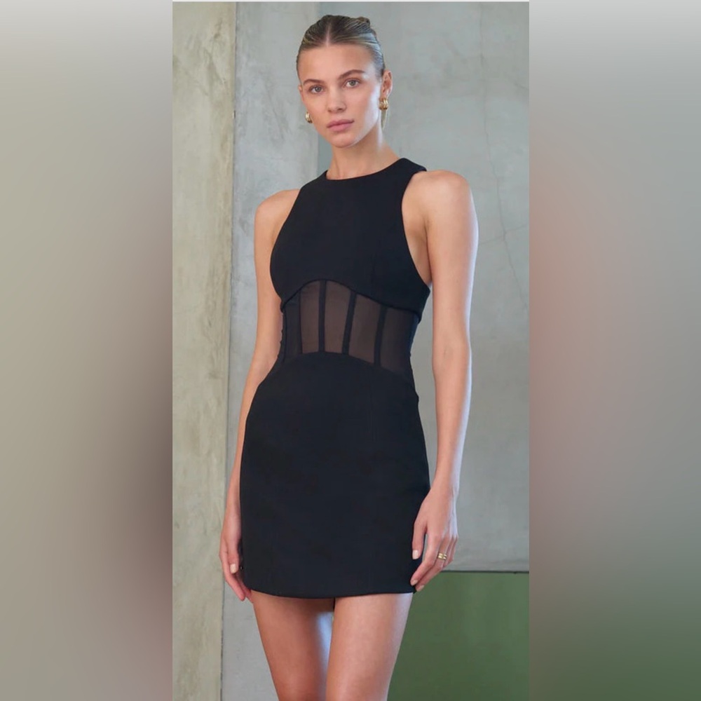 Chic Black Backless Dress with Sheer Accents